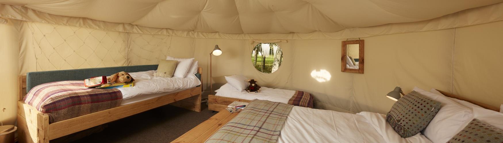 Inside a family yurt at Experience Freedom Yurts & Safari Tents
