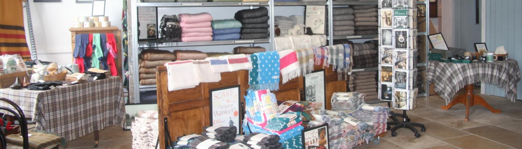 Scarves and blankets on sale at Witney Blanket Hall